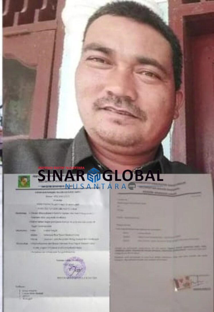 Keterangan gambar: Pangulu Sinaman Labah  Jenni Rahmat Kartolo Damanik yang diduga menghentikan Perangkat Nagori secara sepihak