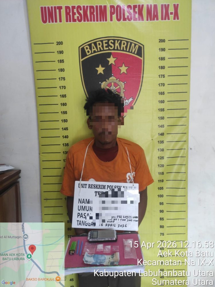 Terduga pemilik narkotika berinisial M alias GINOT (39), warga Dusun V Grojokan, Desa Pulo Jantan, Kecamatan Na IX-X, saat diamankan polisi.